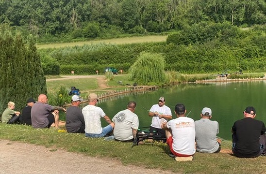 Anglers gathered for a practical coaching demonstration